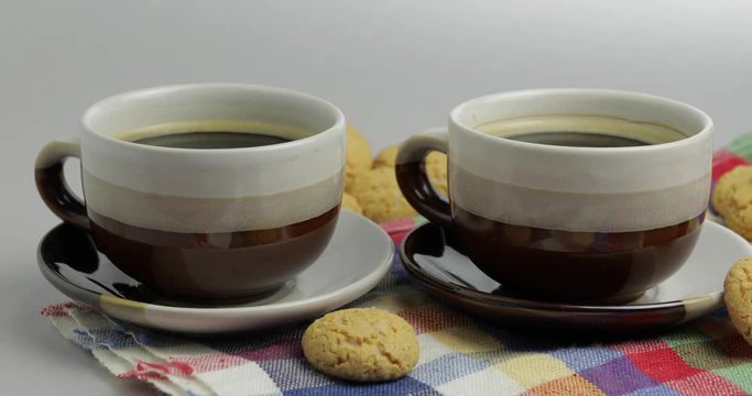 Cookie and two cups of coffee. Kruidnoten, pepernoten, strooigoed