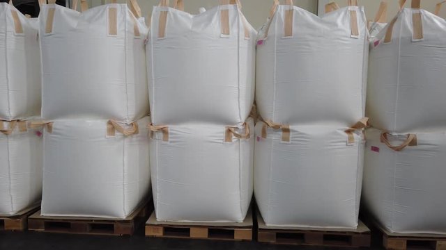 Stacking of bulk cargo in jumbo bags are store in warehouse