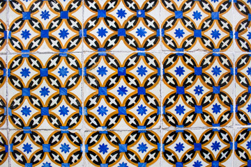Traditional Portuguese ceramic tiles wall. Typical exterior decoration on house in Portugal.
