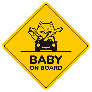 Yellow sign with inscription Baby on board and a picture of a baby fox in a car