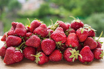 group of strawberries on rustic background