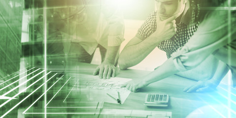 Architects working on plans; multiple exposure