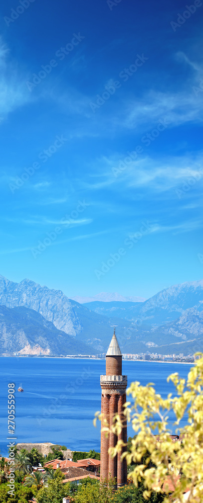 Poster elevated view of cityscape image of historic district of Antalya over Mediterranean sea and high mountains with clear blue sky in Turkey - Posters