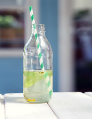 One bottles with lemonade.