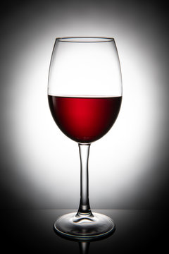 Glass of red wine, isolated on white background