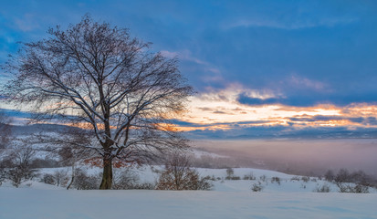 Obraz na płótnie Canvas Winter mountain colorful sky and sunset