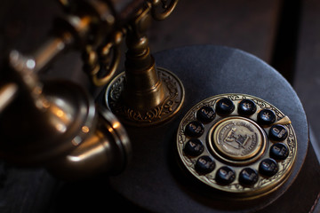 old telephone and clock