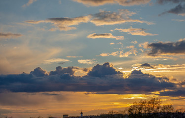 The sun is hiding behind the clouds. Magnificent view