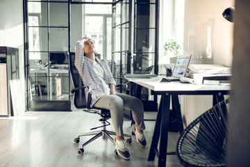 Secretary feeling tired and exhausted having too many tasks