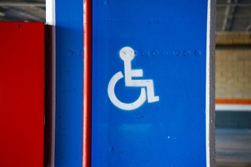 wheelchair traffic sign in the street, traffic signal in the city