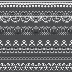 Lace openwork seamless vector pattern, retro ornamental repetitive design with flowers and swirls in white on gray background