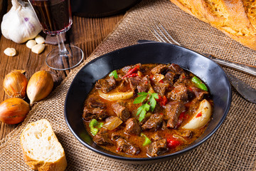 classic beef goulash with peppers and onions