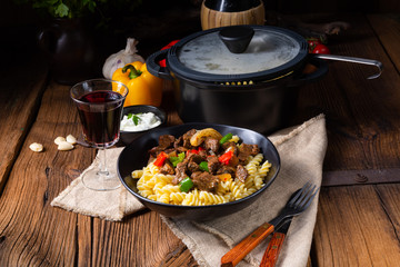 Fussili noodle with klaschise spicy goulash and paprika