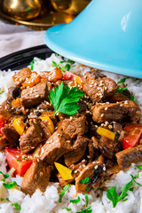 Tajin beef stew with rice paprika and sesame seeds