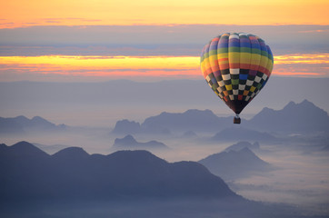 Hot air balloon over the sea of mist.