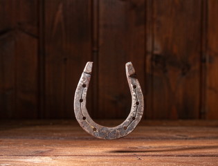 Horseshoe Wooden Background