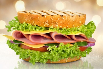 sandwich with ham, cheese and tomato isolated on white background