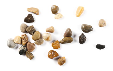 Colorful, decorative pebbles, rocks isolated on white background, top view