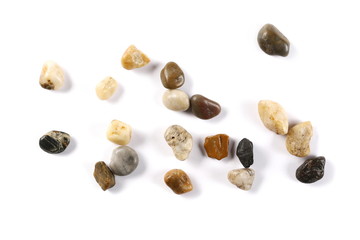 Colorful, decorative pebbles, rocks isolated on white background, top view