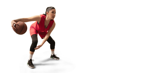 Isolated Female basketball player with ball on white background