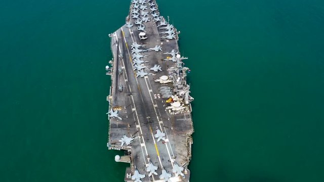 Aerial view America battleship navy nuclear aircraft carrier, USA military navy ship airplane carrier full loading plane fighter jet aircraft, United States of America, USA, 4K.