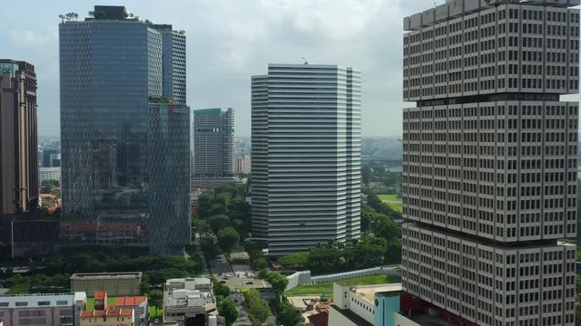 day time flight over singapore city center aerial panorama 4k 