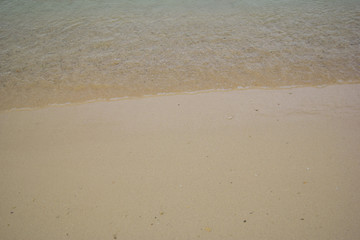 Fototapeta na wymiar beach blurred abstract background shoreline close up stylized