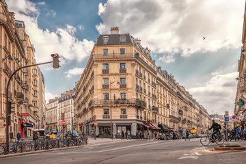 Streets of Paris, France. Blue sky, buildings and traffic. Shot in april daylight.