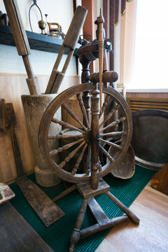 Old village spinning wheel in a junk shop