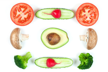 Ingredients for homemade pizza on white background. Top view. Ingredients for salad: radish, slices mushrooms, slices tomatoes, cucumbers, broccoli, avokado and salad . Healthy food conception