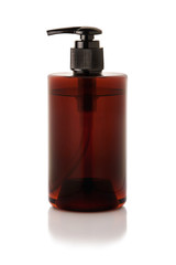 brown plastic  bottle with dispenser pumps isolated on white background with reflection