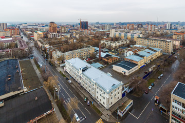 Fototapeta na wymiar Rostov-on-Don / Russia - 30 march 2019. Aerial view of the city center with residential and commercial buildings in wet rainy weather