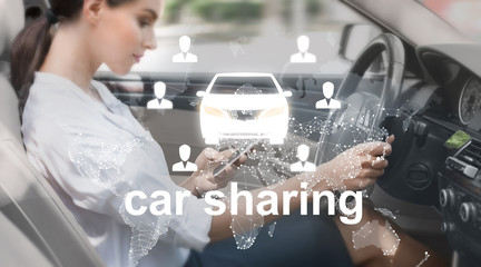 Woman driving rent automobile and using smartphone