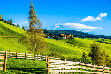 The wooden fence along pasture