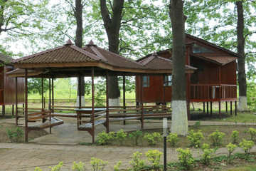 Recreation area in an oak forest with cottages and beautiful arbors. Azerbaijan, Lankaran
