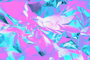 Abstract trendy holographic background in bright pink, violet and mint colors