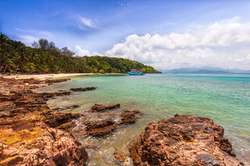 Beautiful rocky on seashore in tropical beach of Koh Wai, Trat province, Thailand.