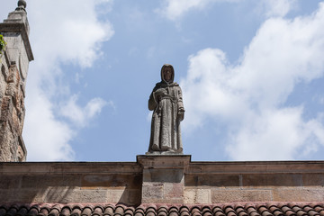 Fototapeta premium Budapest. Hungary. statue of a monk against the blue sky