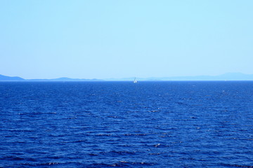 Obraz premium Sailing boat near islands Brac and Hvar on Adriatic sea in Croatia