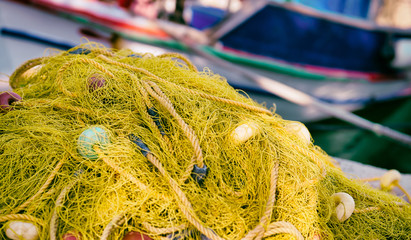 Yellow fishing nets in a port