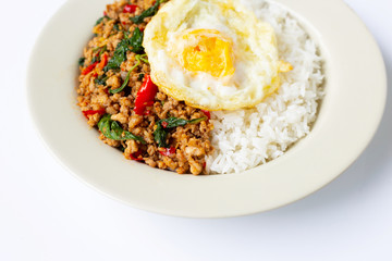 Rice topped with stir-fried pork with holy basil and fried egg