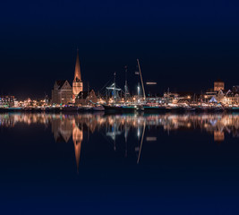 Rostock night panoramic. Warnow canal with ships and Baltic Sea in Rostock Germany in Hanse Sail Festive