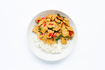 Rice with stir-fried hot and spicy pork with holy basil on white