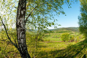 Fototapeta premium beautiful mountain valleys and mountains on a bright sunny day on the background of a wide valley