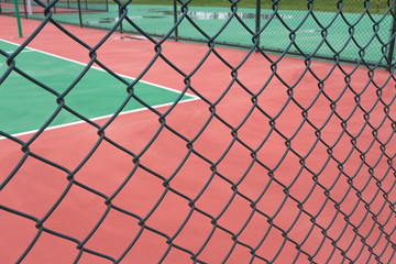 Fototapeta premium Wire guardrail for outdoor plastic basketball court