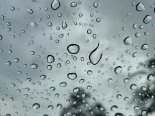 Water droplets on windscreen.