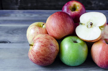 lots of apples red and green on blue background