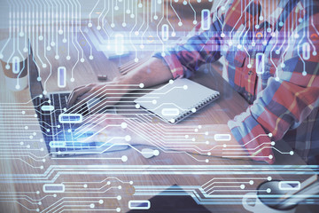 Businessman with computer background with technology theme hologram. Concept of big data. Double exposure.