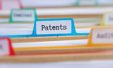 File folders with a tab labeled Patents