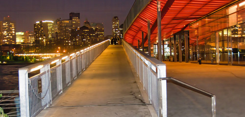 Pier 17 in new York City at night with city skyline view